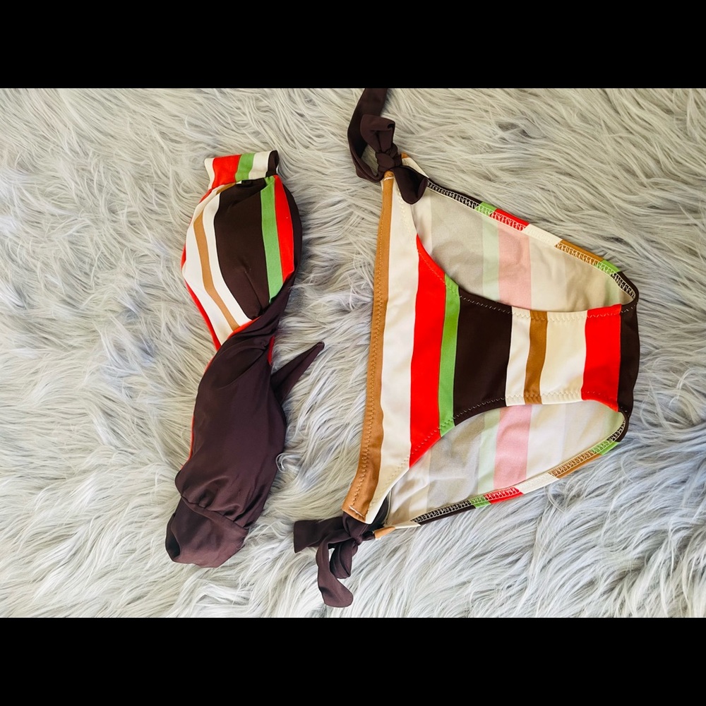 Bundle of swim suits. Use 1 time. One new.